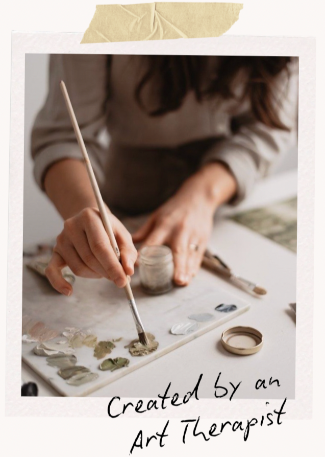 Close-up of an artist applying paint to a palette with a brush, with a hand holding a small jar of paint nearby. Handwritten text on the image reads 'Created by an Art Therapist.'