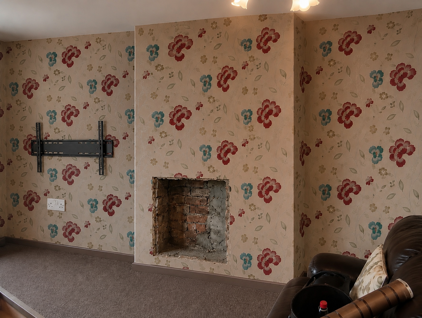 Current electric fire was removed but had the old space for a wood fire. Client wanted to try and re-use the electric fire.