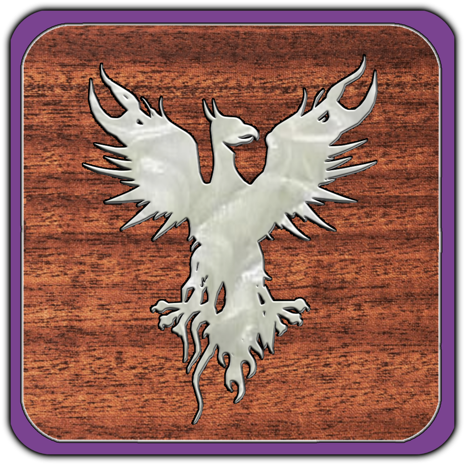 A metallic emblem of a double-headed eagle with wings spread, mounted on a wooden surface with a purple border.