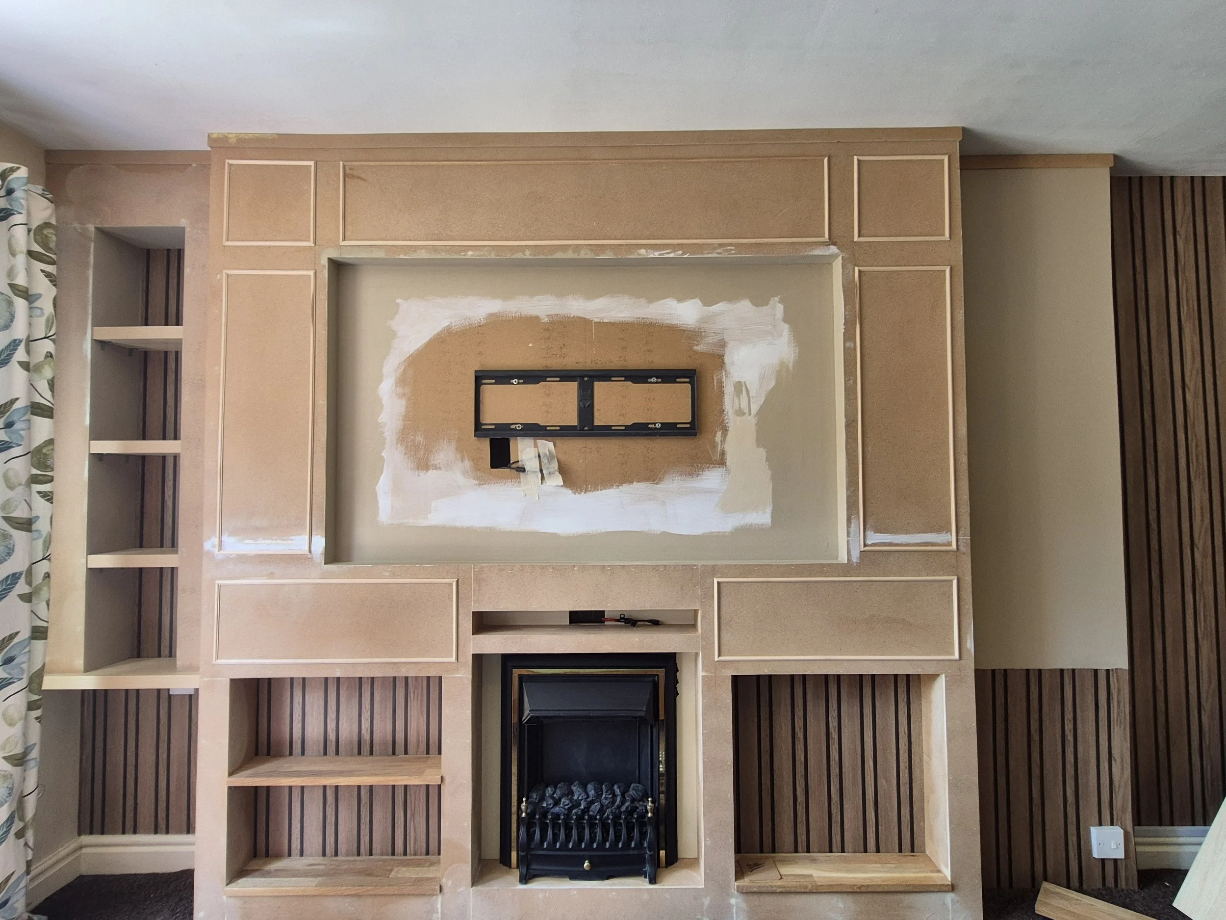 I made it work, panelling and detail trims going up. 