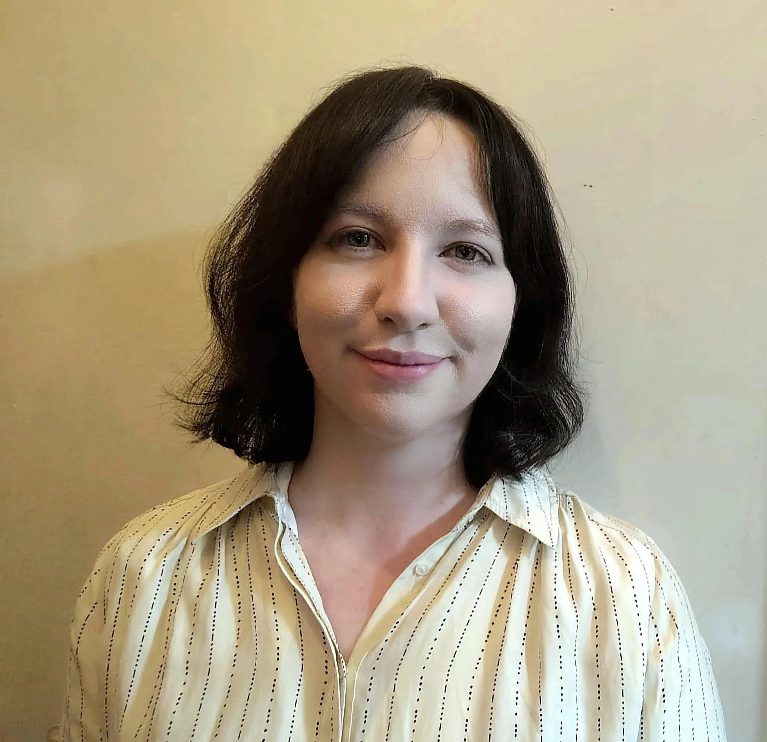 image of a smiling woman. It is Dara-Emma McGlacken of McGlacken Ryan Cognitive Behavioural Therapy and Counselling