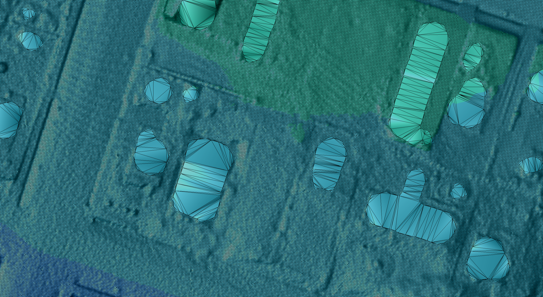 Close-up of a computer chip with a digital grid overlay and multiple circuit pathways visible.