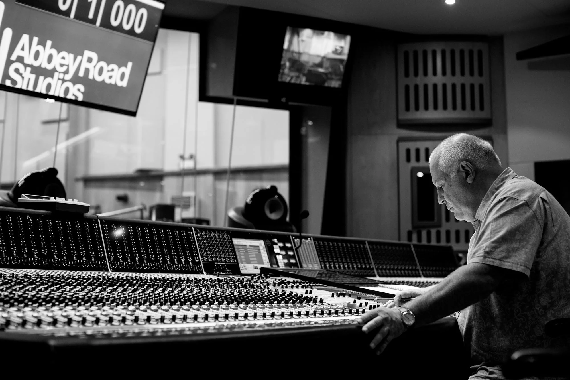 Control room, Abbey Road Studios, London, operating a large audio mixing console in a recording studio.