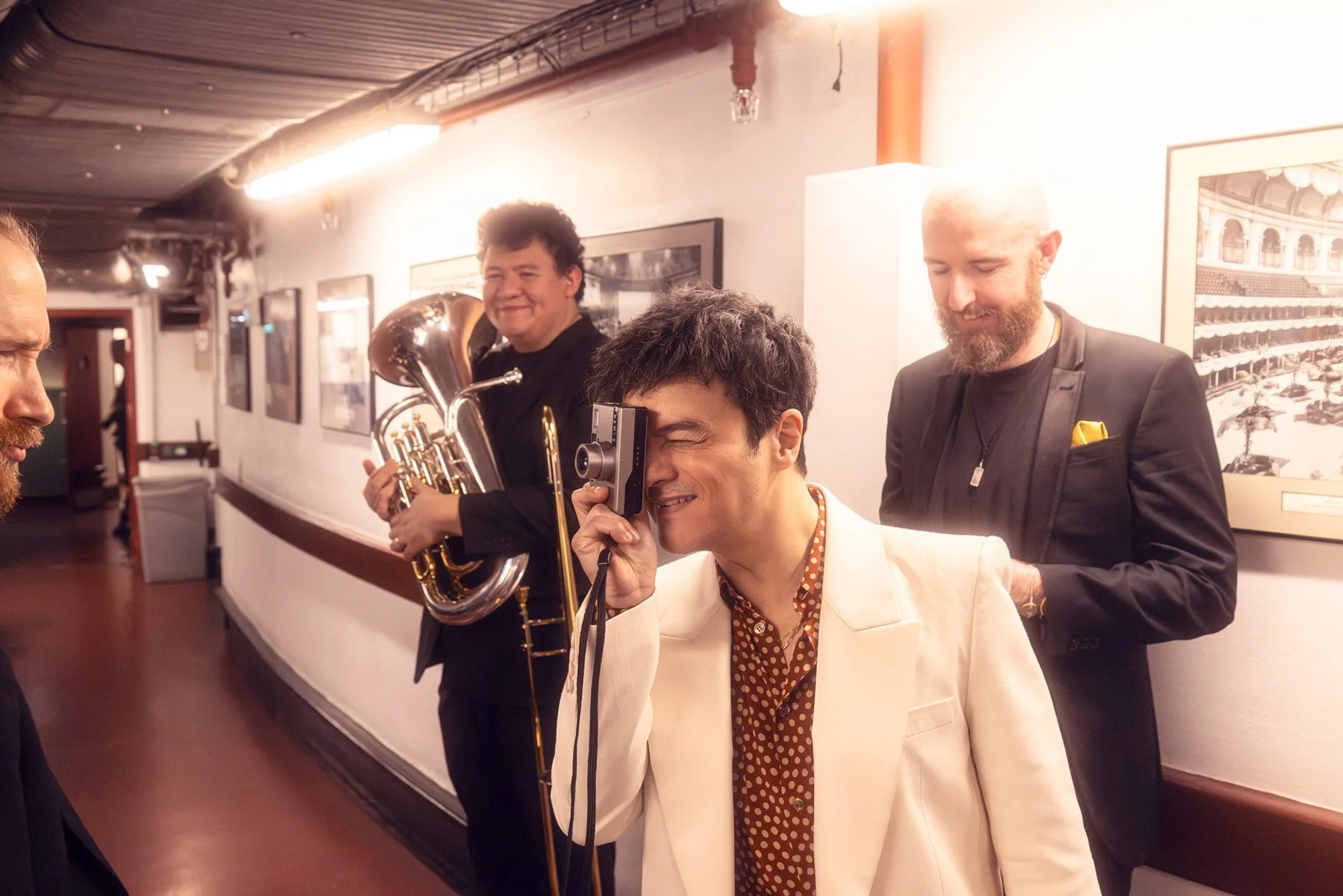 Jamie Cullum taking photos backstage at the royal Albert Hall, London