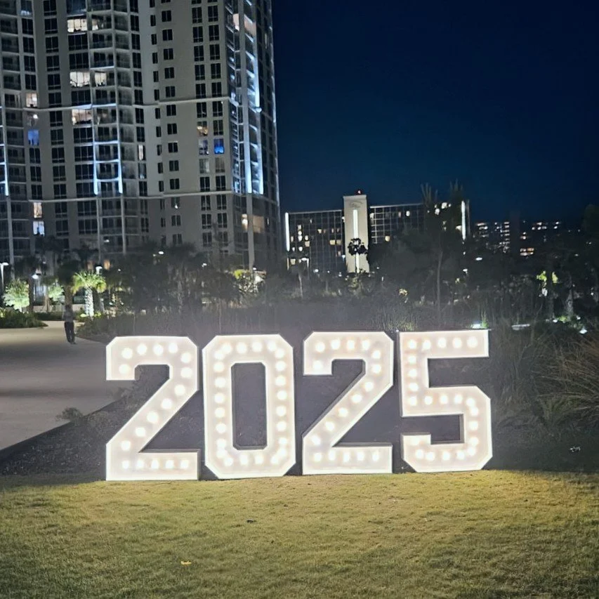 Graduation Light-up sign displaying the year 2025 on a grassy area at night. Large Lighted Numbers