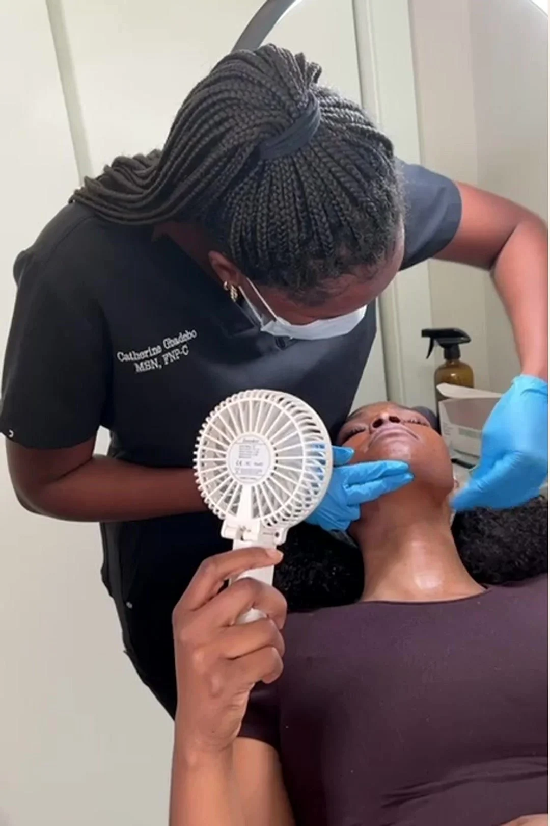 Catherine Gbadebo, MSN, FNP-C performing a VI Peel treatment at FORMED. in Silver Spring, Maryland