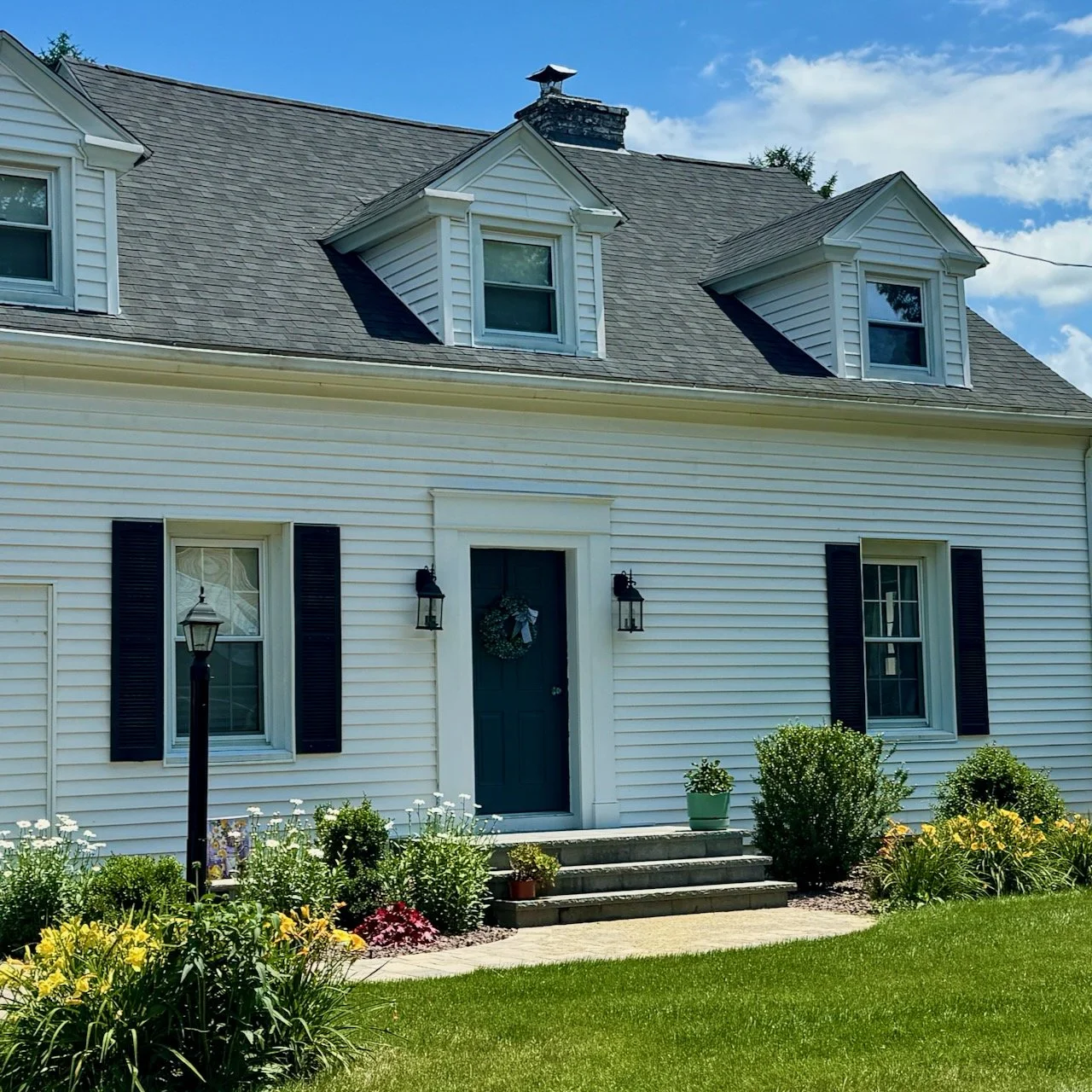 PrettyLittleHouseFlowersDormer.jpeg