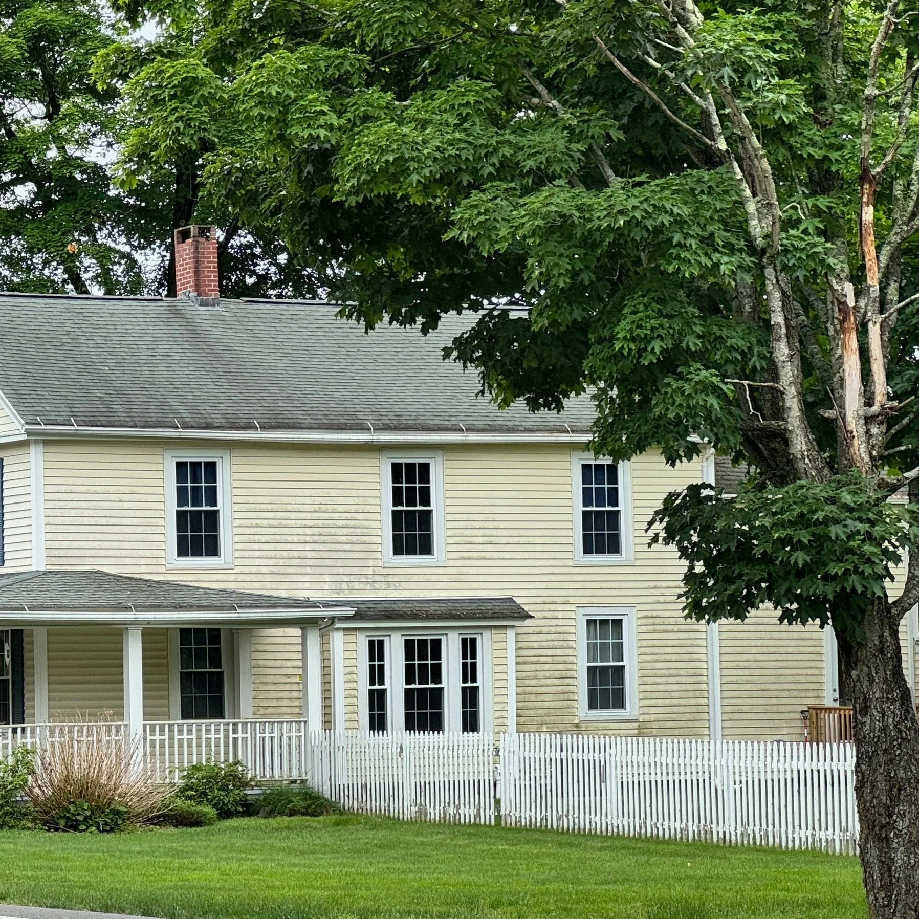 YellowHousePicketPorch.jpg