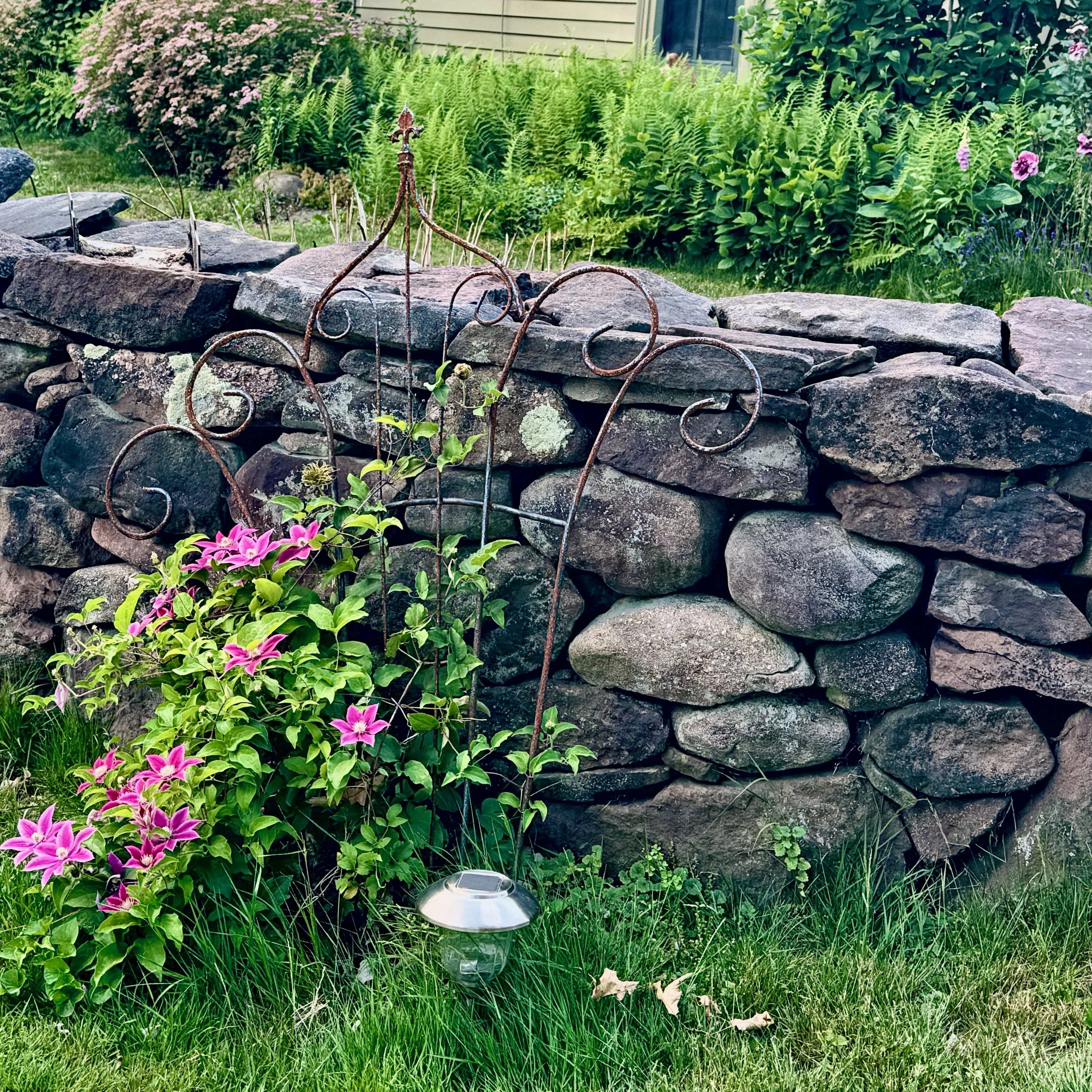 stonewallOfGreenHouseGreenDoor.jpeg