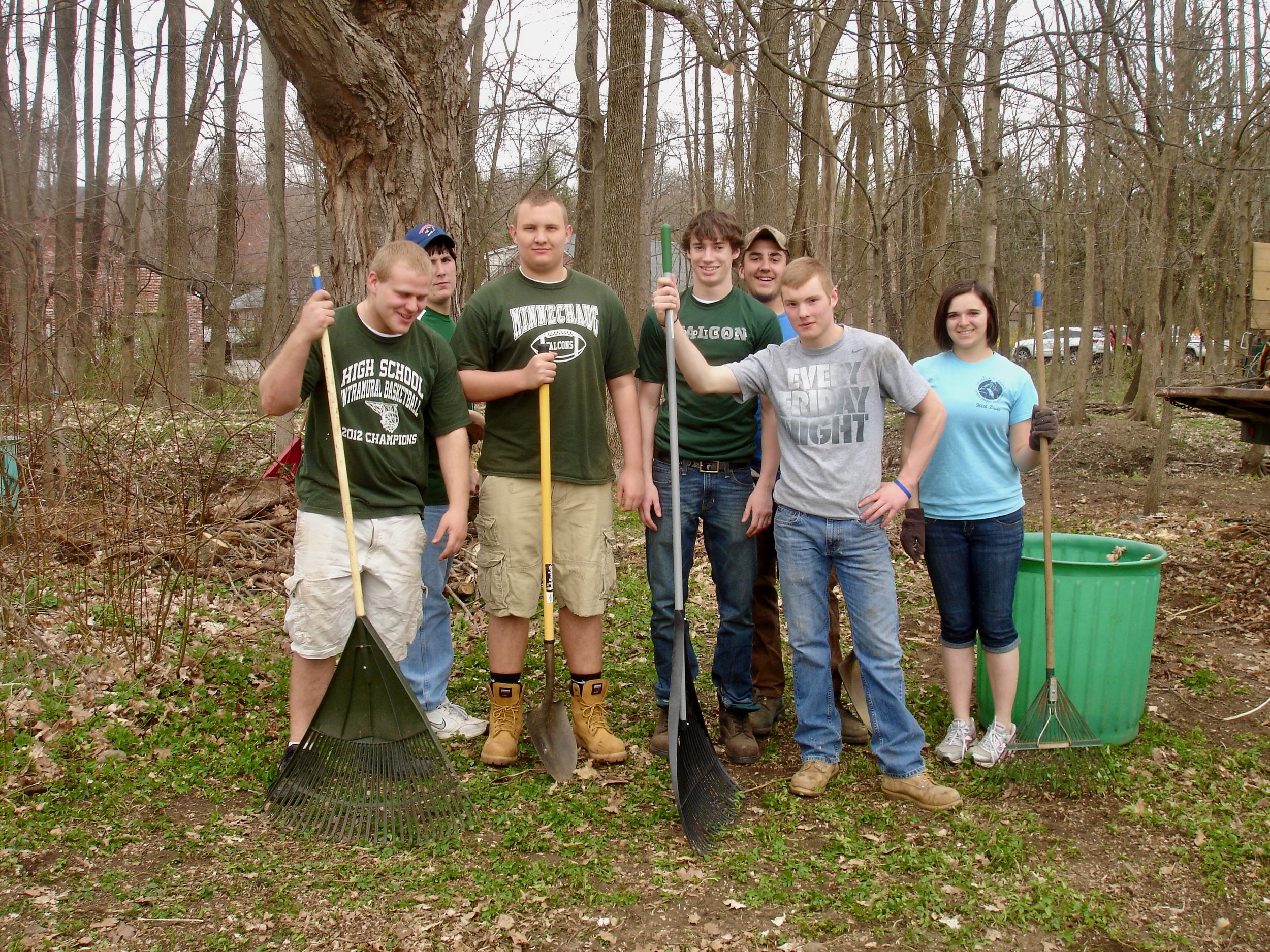 April 18, 2013   Members of the Minnechaug Regional High School football team volunteered to clear brush and prepare the site for the new gardens. 