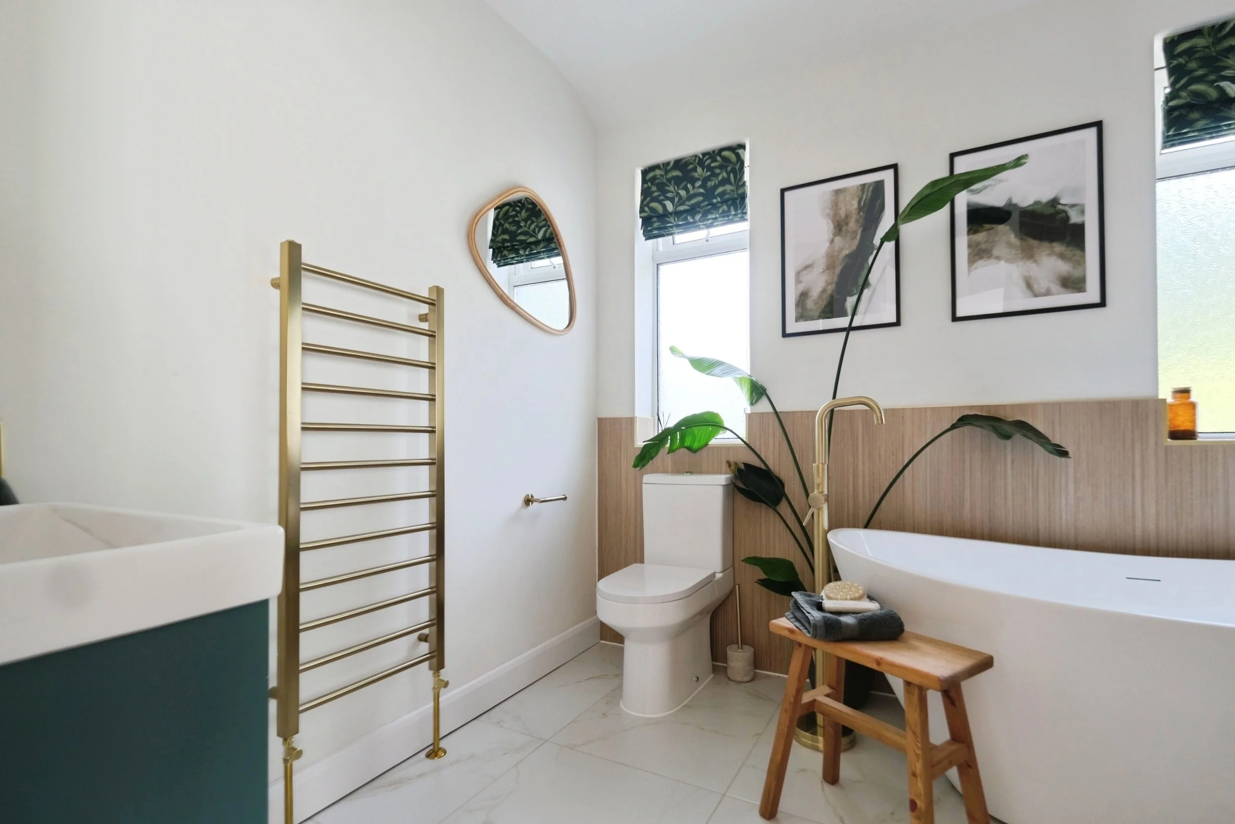 Large luxury bathroom, styled in biophilic design to complement fittings.