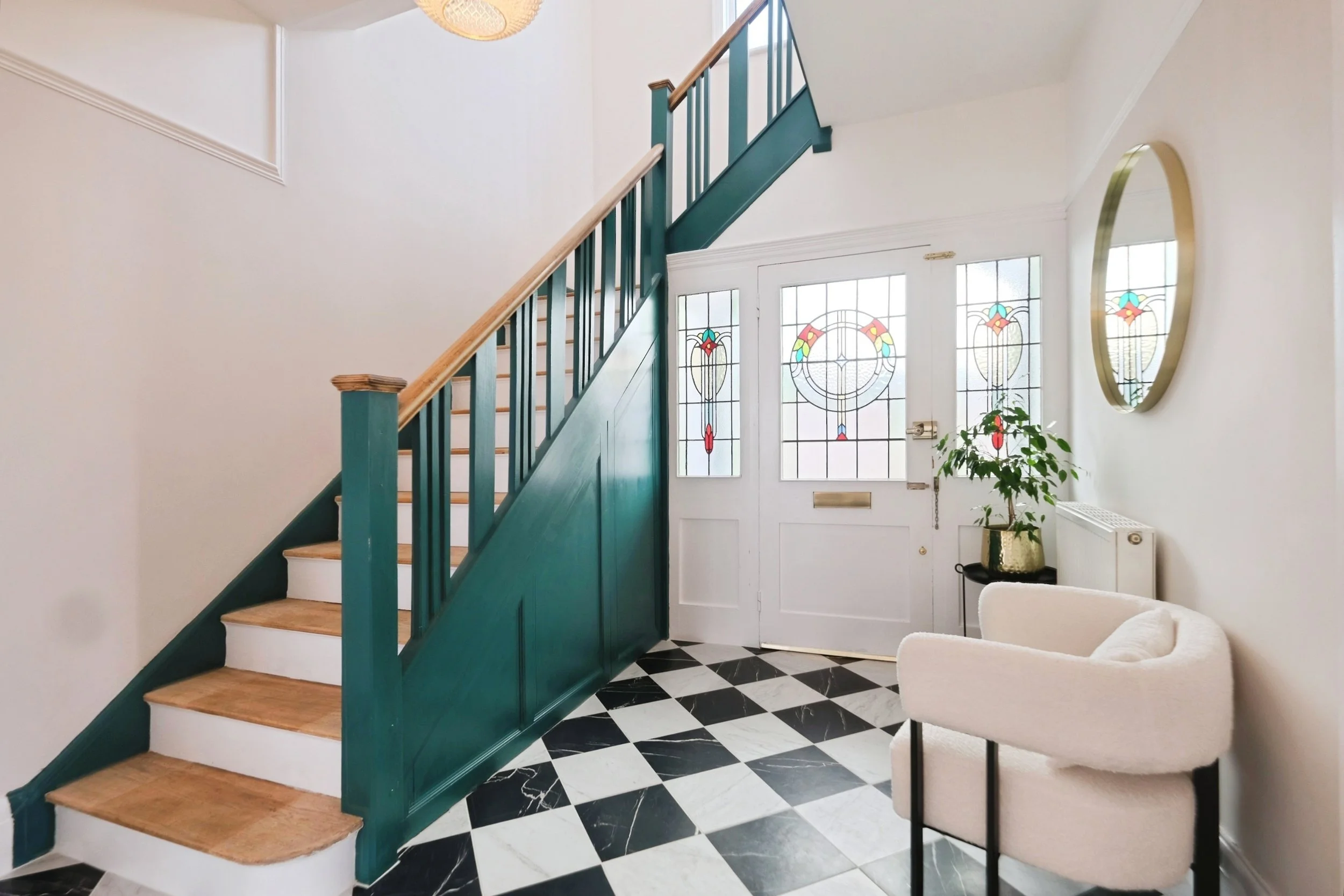 Styled hallway in homeowner house, staged ready to sell showing the space and use.
