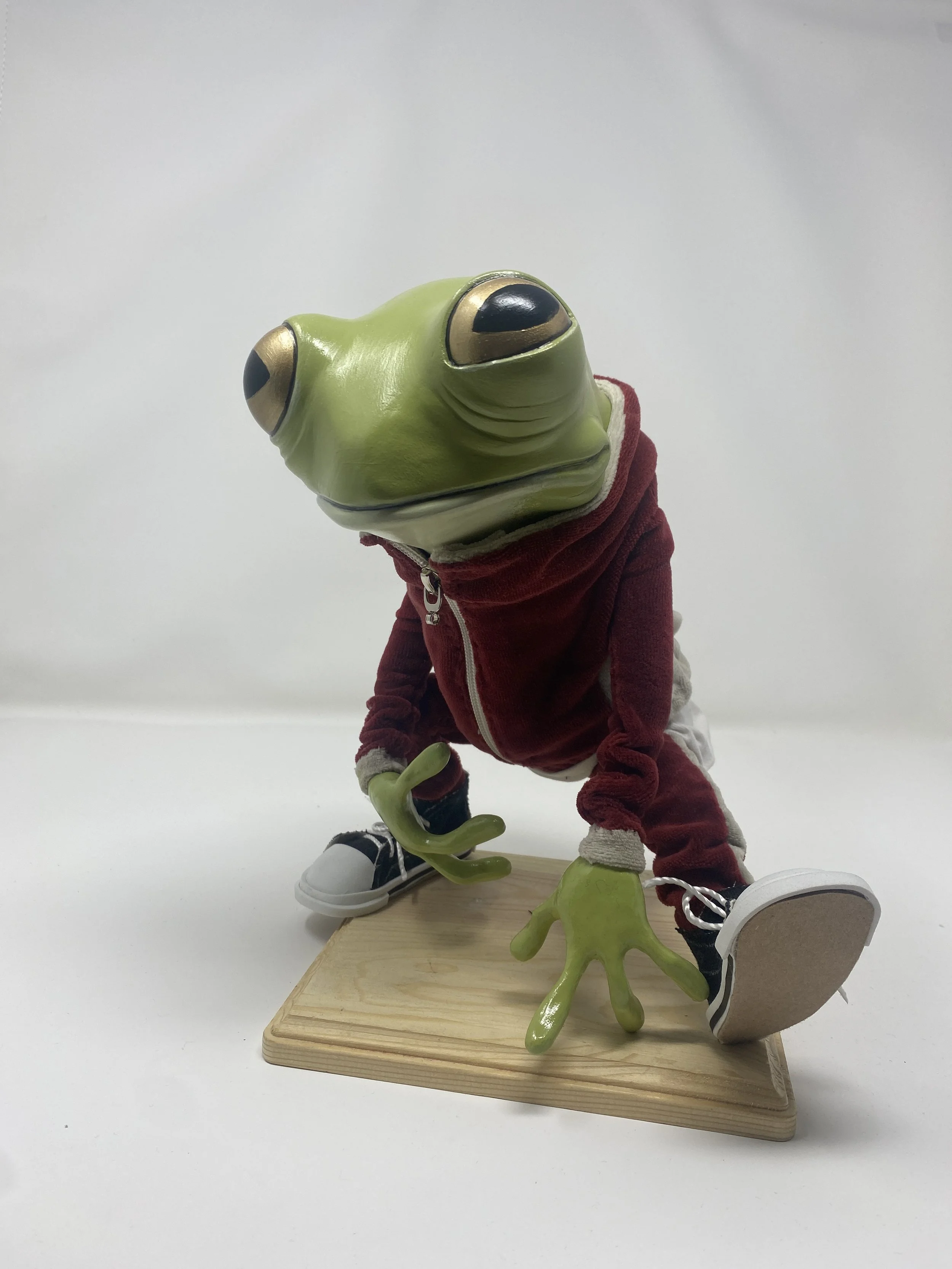 Frog in a track suit 
2023