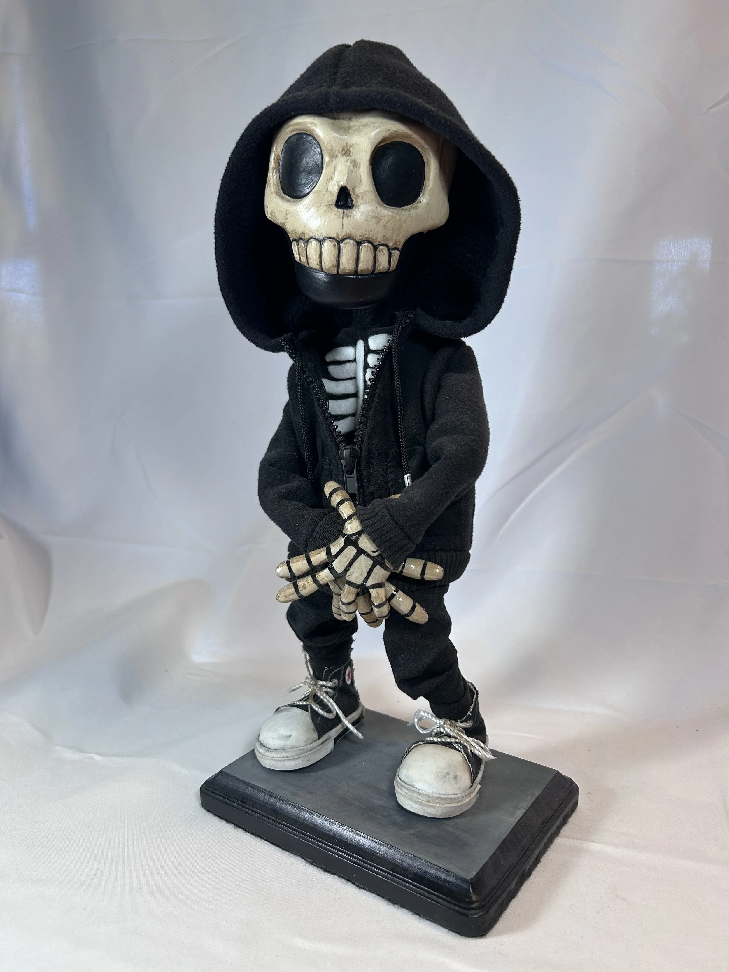 Skeleton in hoody
2023
14” tall
Fabric, wire, paperclay, acrylic paint