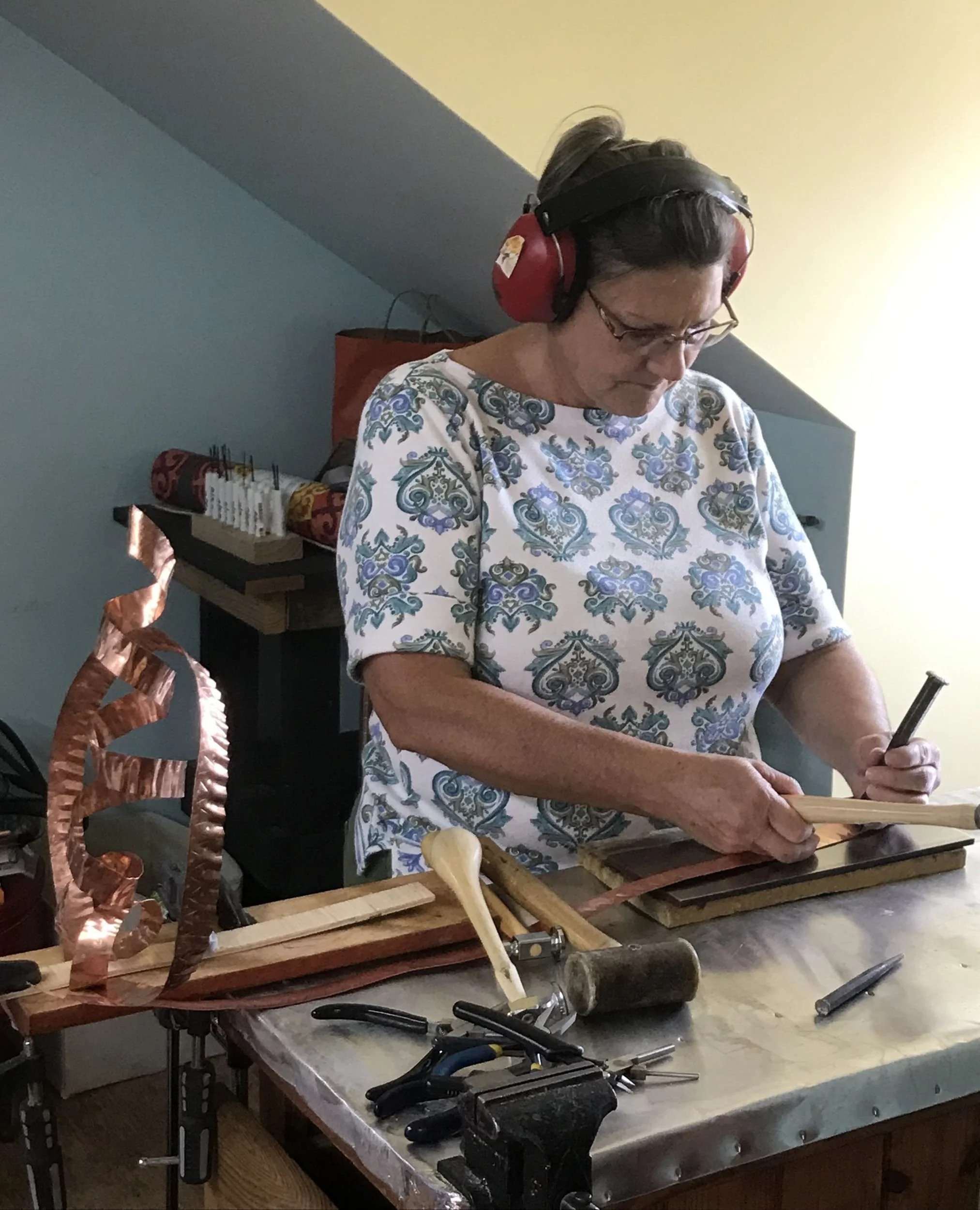 Creating the "Shawl Dancer" sculpture out of copper. 