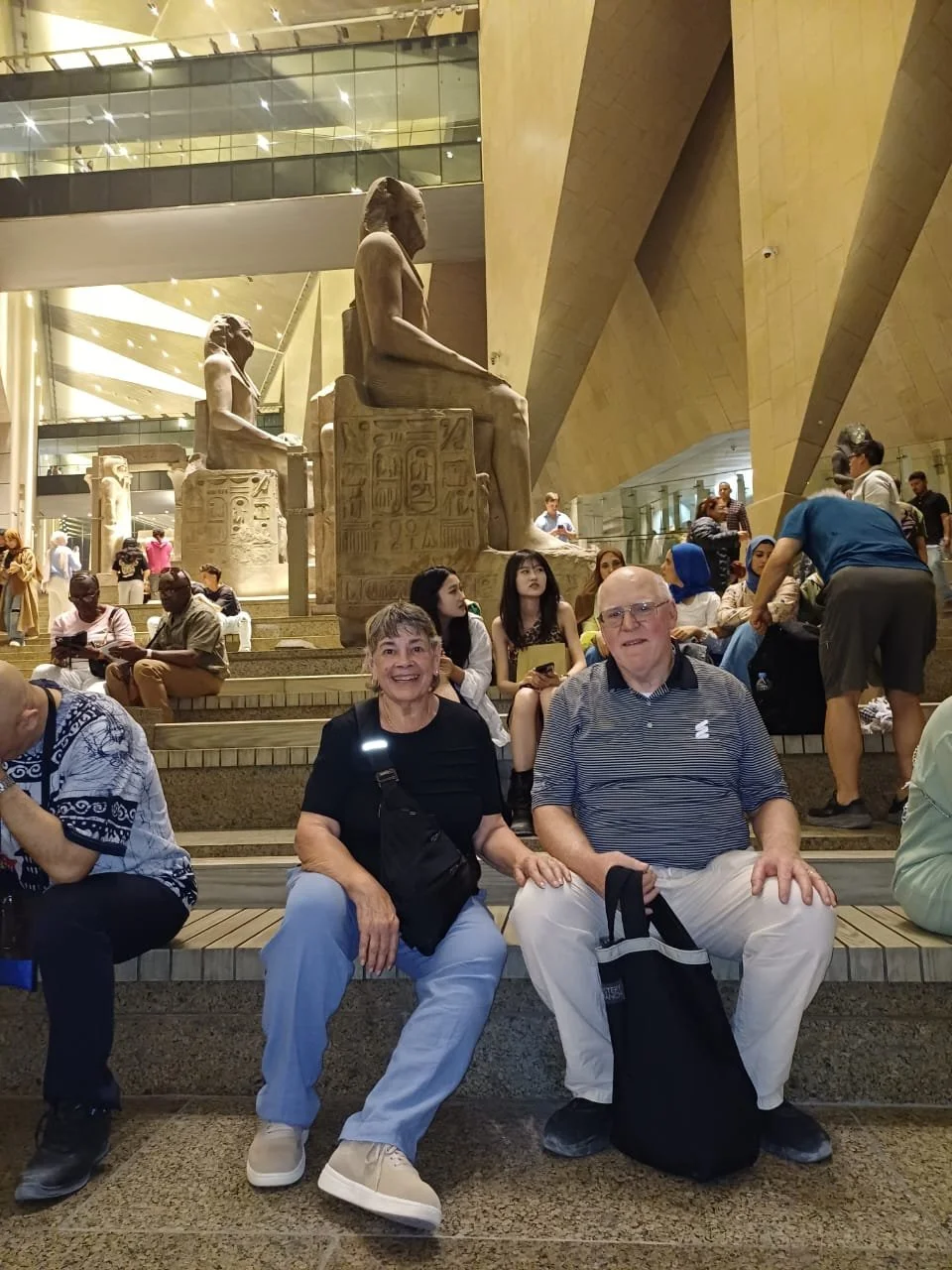 A small group of travelers at the Pyramids of Giza during an Egypt Uncharted private journey.