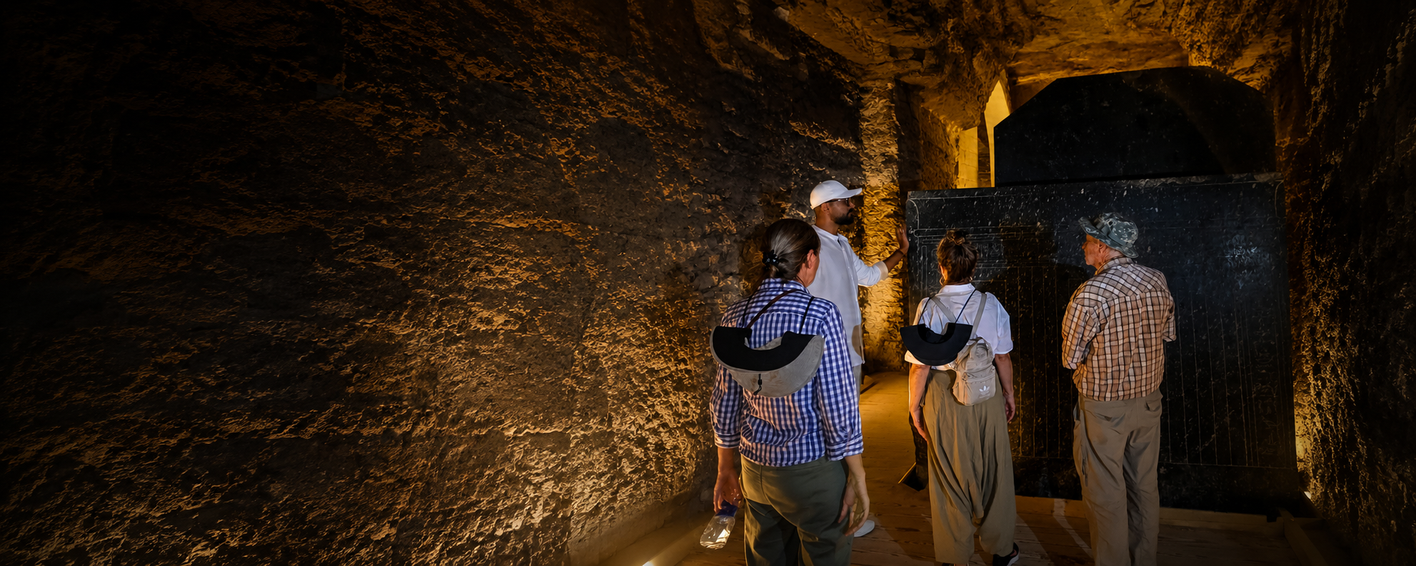Small group inside the Serapeum of Saqqara with Egypt Uncharted guide
