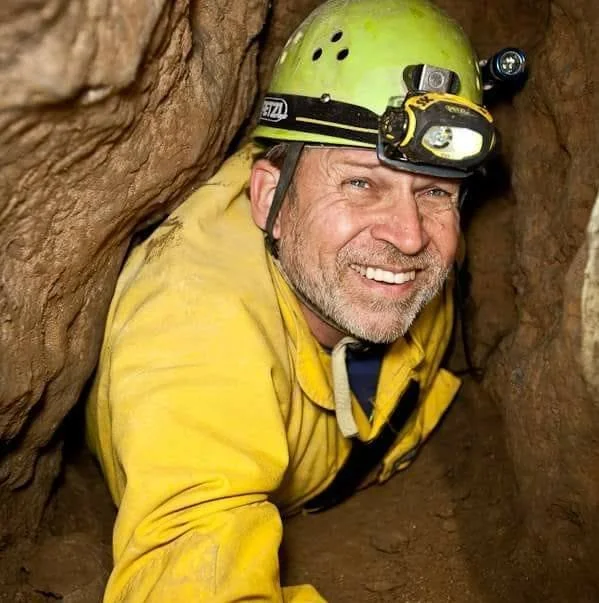 Explorer and Explorers Club Fellow Chris Nicola inside a cave during one of his expeditions — a collaborator and guest on Egypt Uncharted journeys.