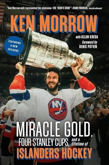 Book cover with a photograph of Ken Morrow holding the Stanley Cup above his head, wearing a New York Islanders hockey jersey, surrounded by fans, with the title 'Miracle Gold' and other text about his achievements and career.