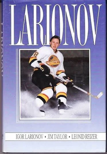 Book cover titled 'LARIONOV' with a photo of a hockey player in a white jersey skating on ice with a hockey stick.
