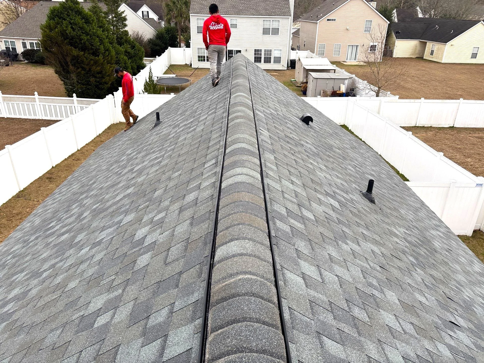 team inspecting roof