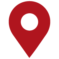Red map marker icon with a black circle in the center