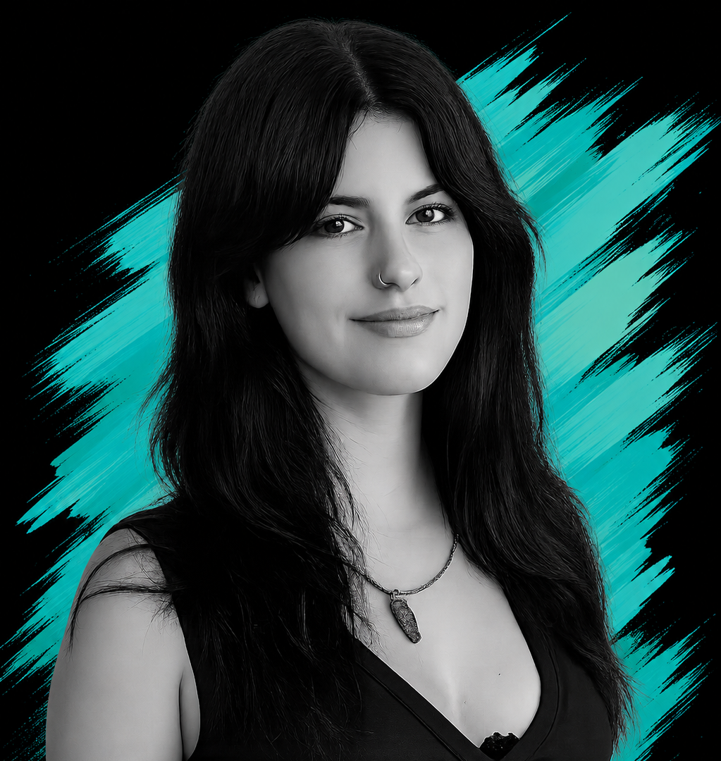Black and white portrait of a woman with long dark hair and a nose ring, wearing a necklace and a sleeveless top, with a bright teal streak background.