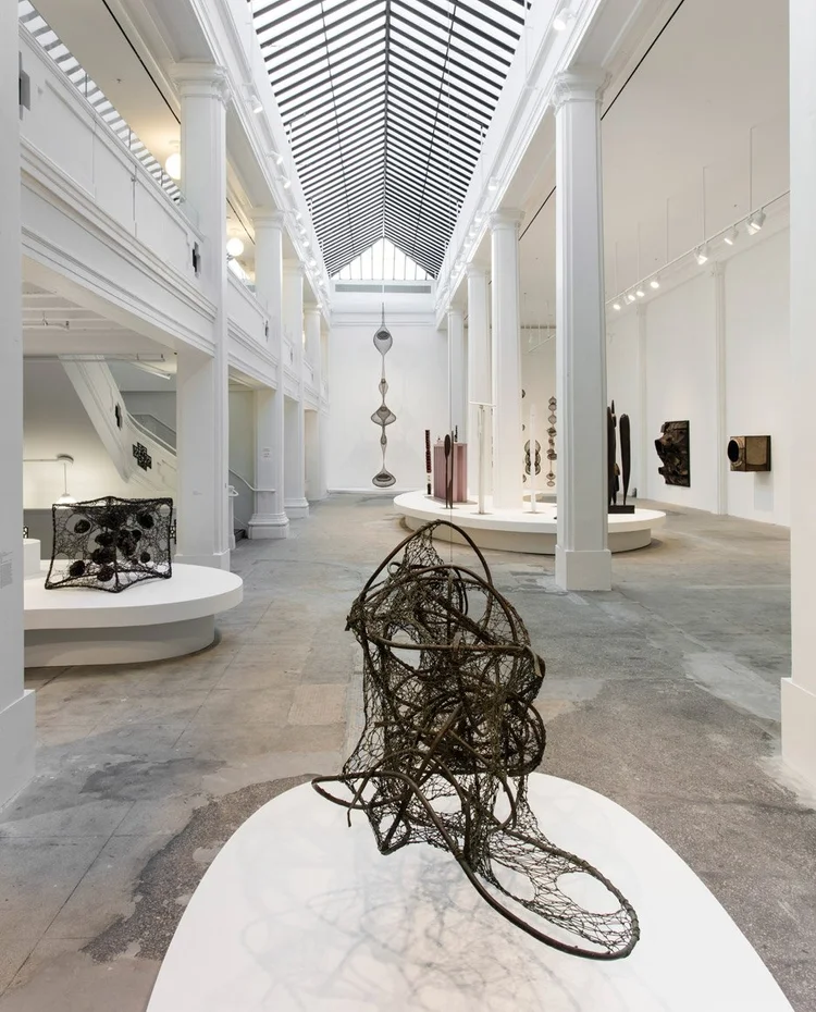 Sculpture installation in a skylit Los Angeles art gallery