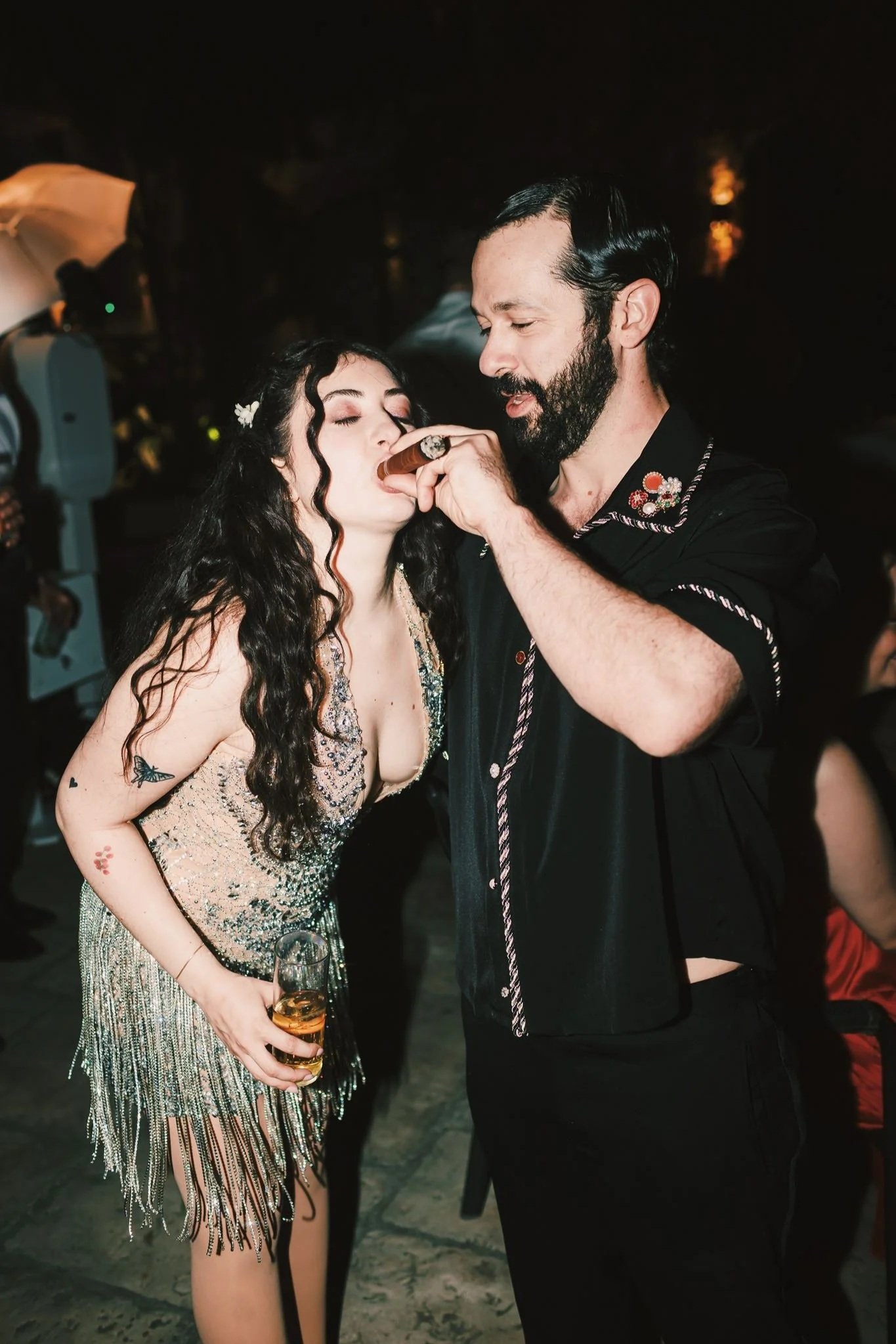 Destination wedding in Spain, wedding couple with  champagne, cigar and caviar dining