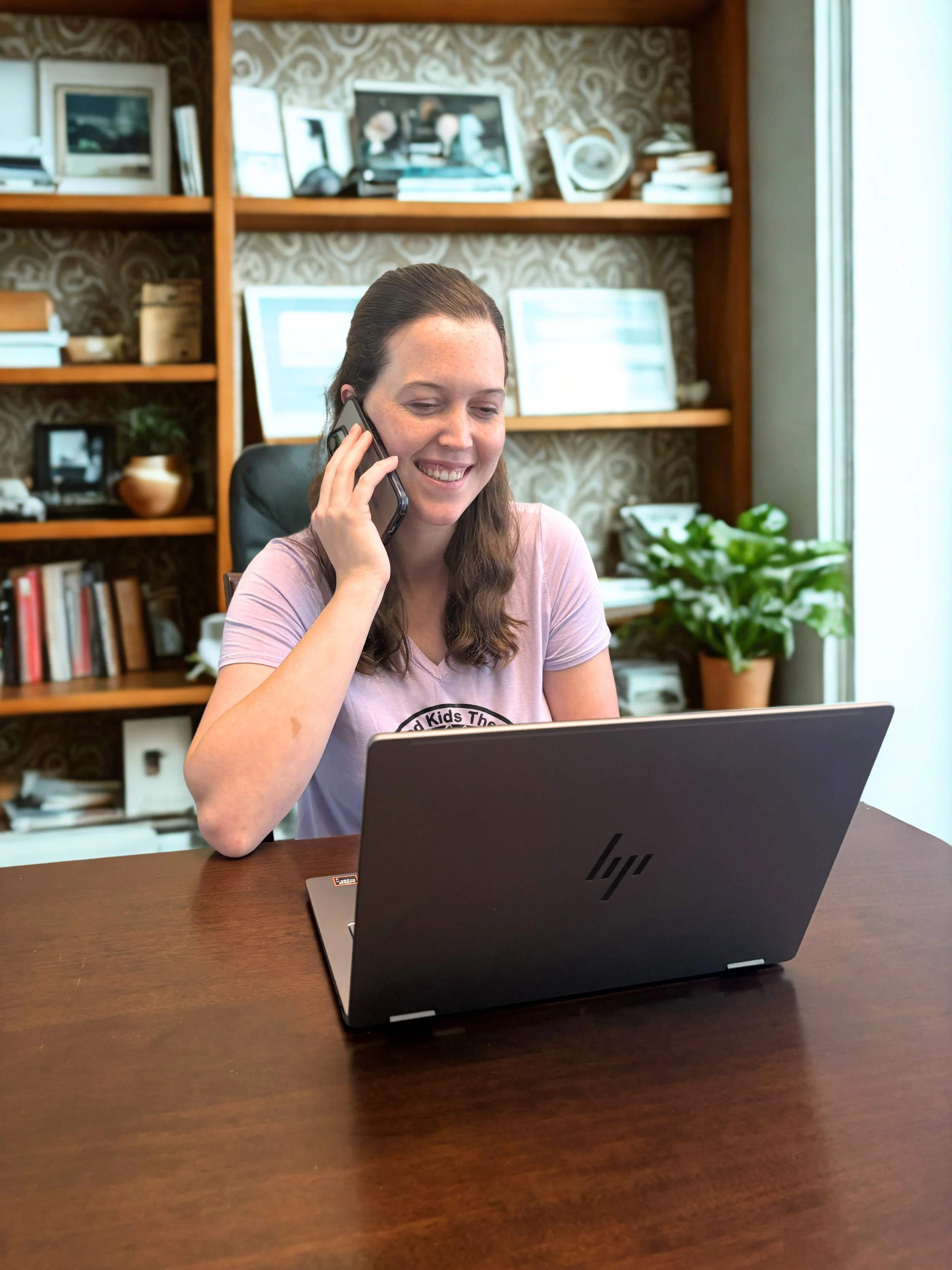 A therapist during a virtual parent coaching session with Rooted Kids Therapy in Mountain Home, AR.