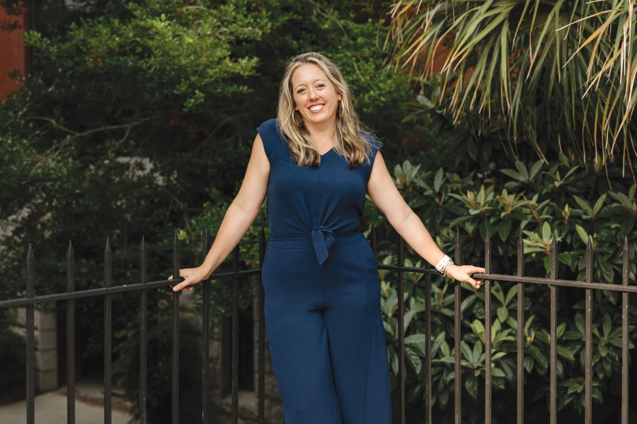 Image of Alison in front of greenery