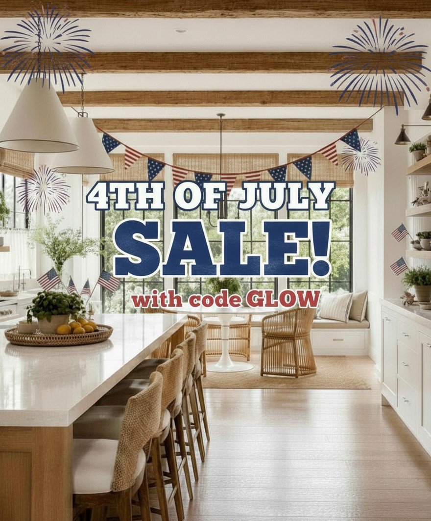Interior of a sunlit kitchen decorated with American flags and fireworks for the 4th of July, announcing a sale with code GLOW.