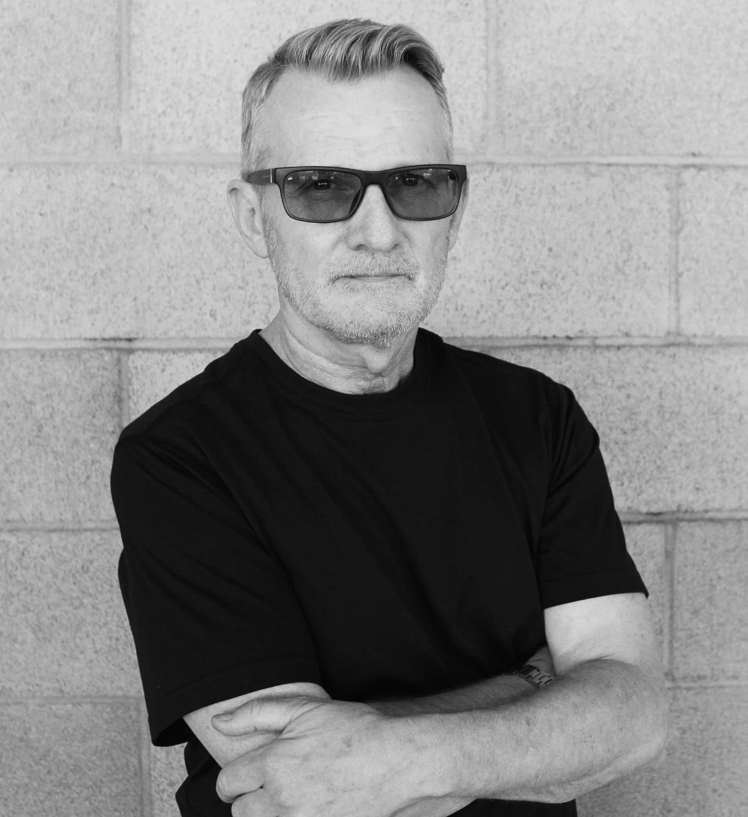 Black and white portrait of Rhys, the owner of Jet Rhys Hair