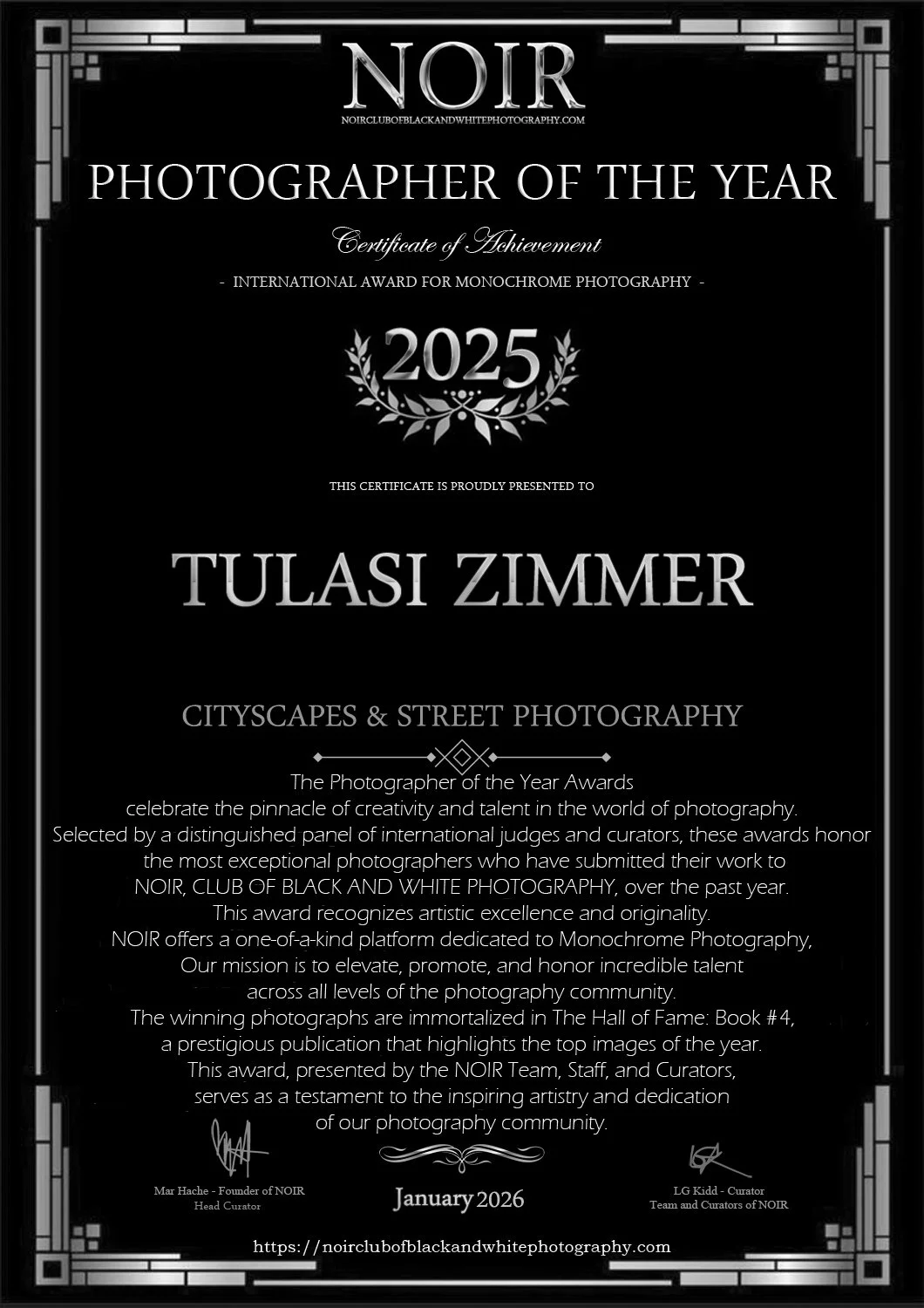 Certificate of Achievement for Tulasi Zimmer as Photographer of the Year 2025, awarded by NOIR Club for monochrome cityscape and street photography, January 2026.
