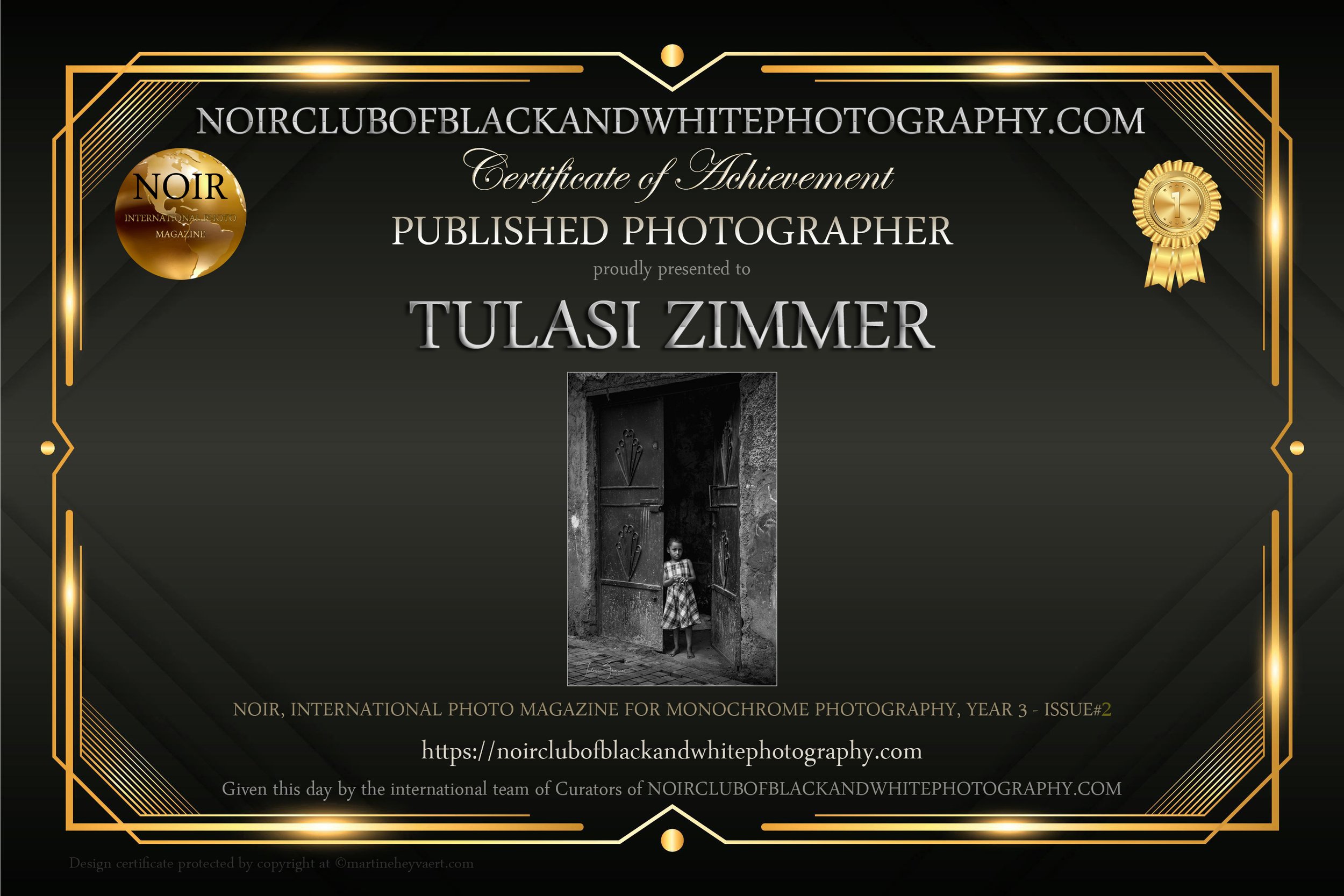 A certificate of achievement from NOIRCLUBOFBLACKANDWHITEPHOTOGRAPHY.COM awarded to Tulasi Zimmer, featuring a black and white photograph of a girl standing in a doorway.