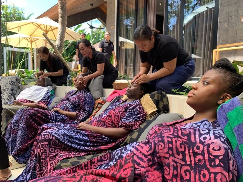 Guests enjoying a traditional Balinese facial treatment during a luxury pamper session on an After Sunday Blessed In Bali experience