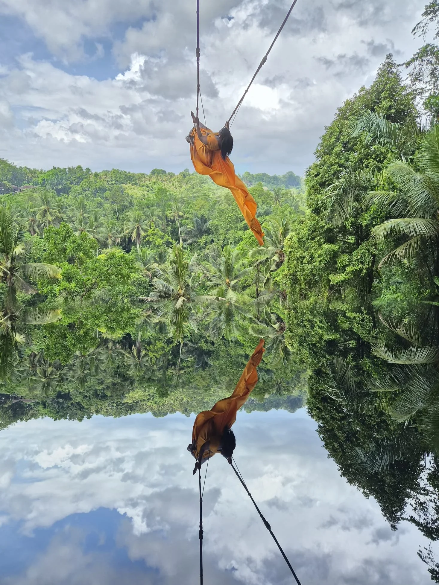 Guest on the Bali swing during the Blessed In Bali luxury group travel experience by After Sunday