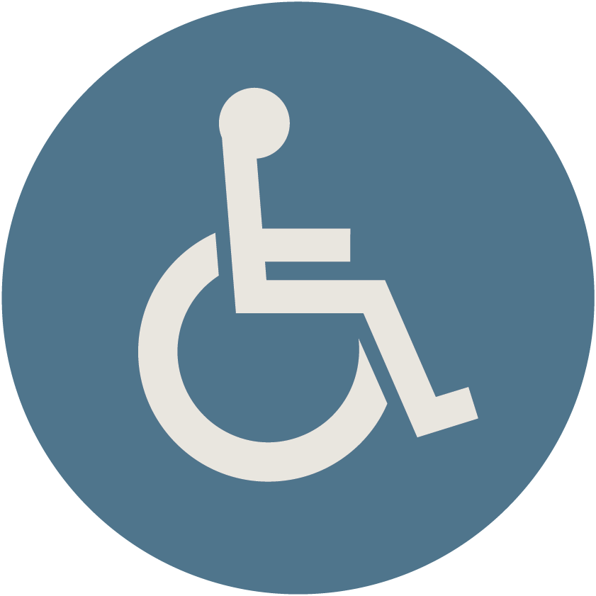 Accessible parking symbol with a white wheelchair icon on a blue circular background.