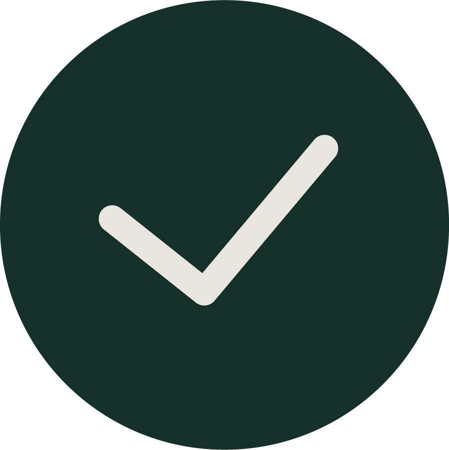 Green circle with white check mark in the center