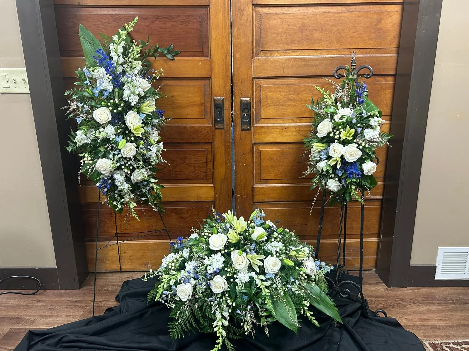 Full Set with Med Casket Spray, Lg Hanging Spray, and a Sm Hanging Spray.