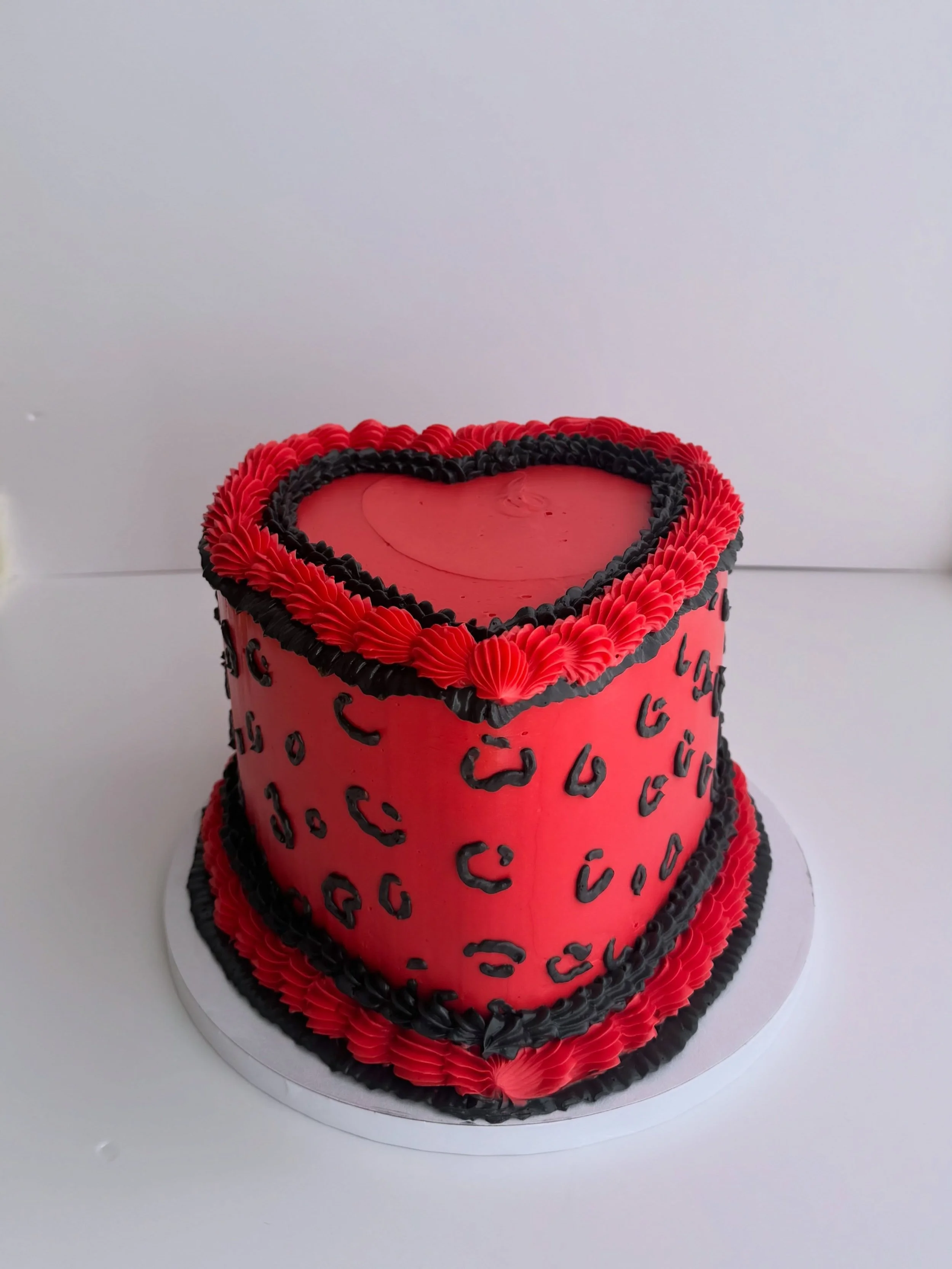 A little red, a little black, and a whole lot of attitude. 
.
.
.
.
#customcakessandiego #customcakesoceanside #animalprintcake