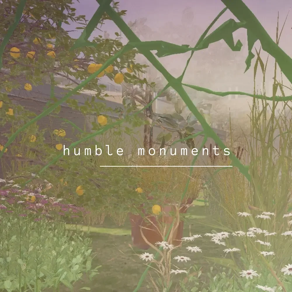 A garden with green plants, yellow flowers, and white daisies, with a house and trees in the background, and the text 'humble monuments' overlayed.