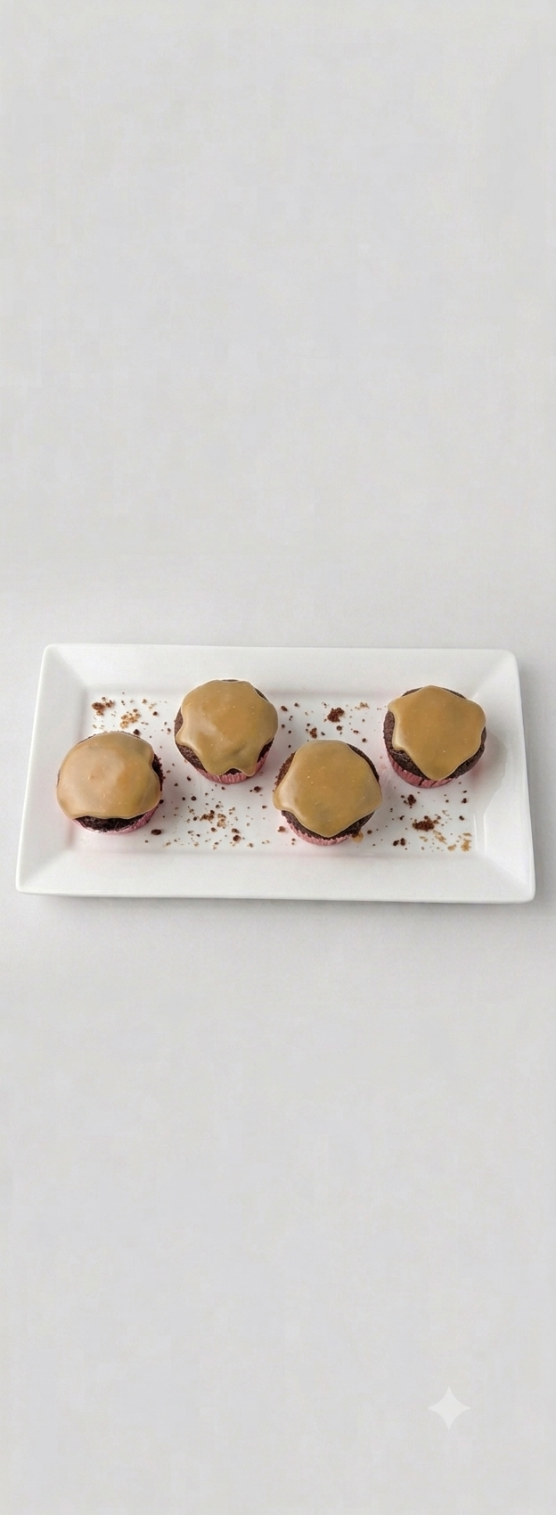 Chocolate cupcakes with caramel frosting