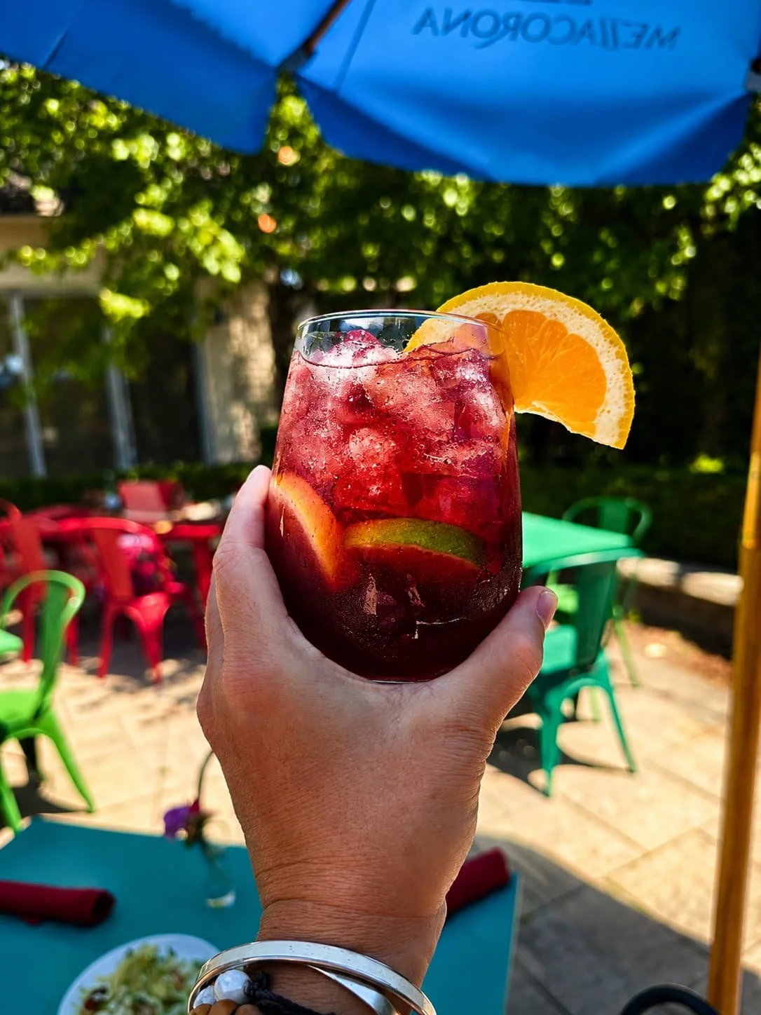 Signature three-day preparation sangria with orange slice at Tapas & Tacos Beer Garden in Lake Leelanau, Michigan