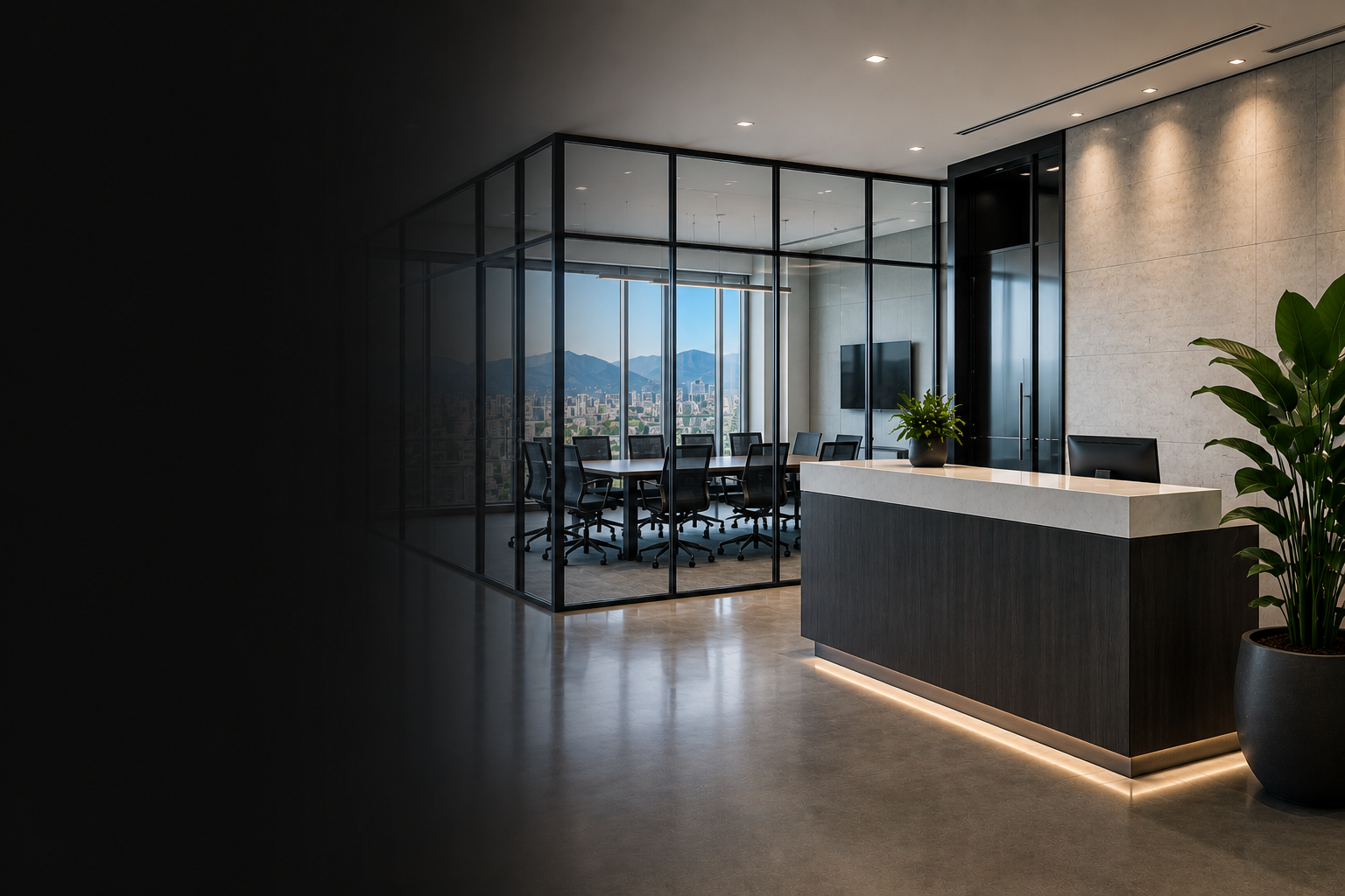 Modern office reception area with a dark wood desk, potted plants, and a glass-enclosed conference room with a view of mountains and cityscape.