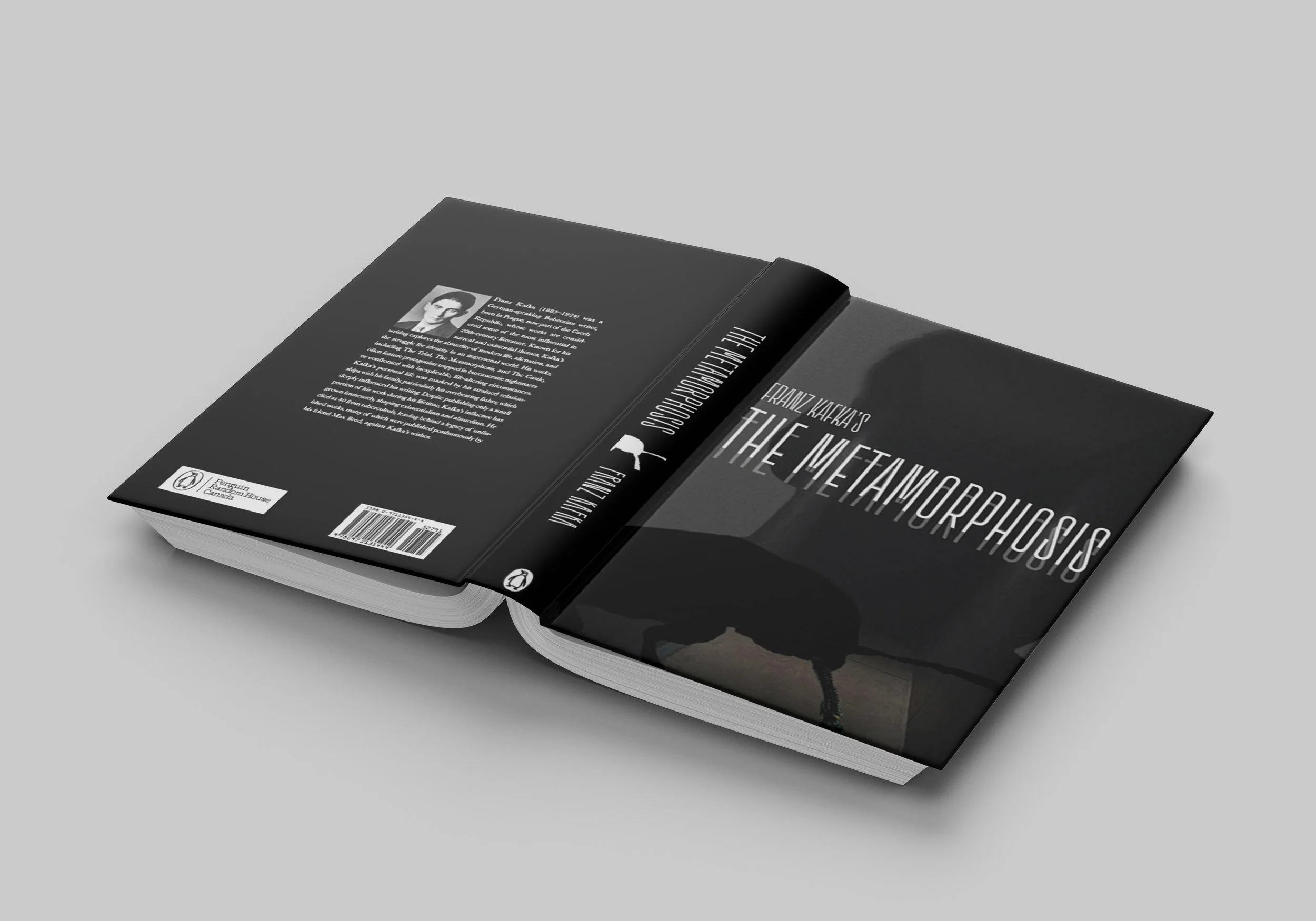 The Metamorphosis book with the book laid faced down on a grey background.