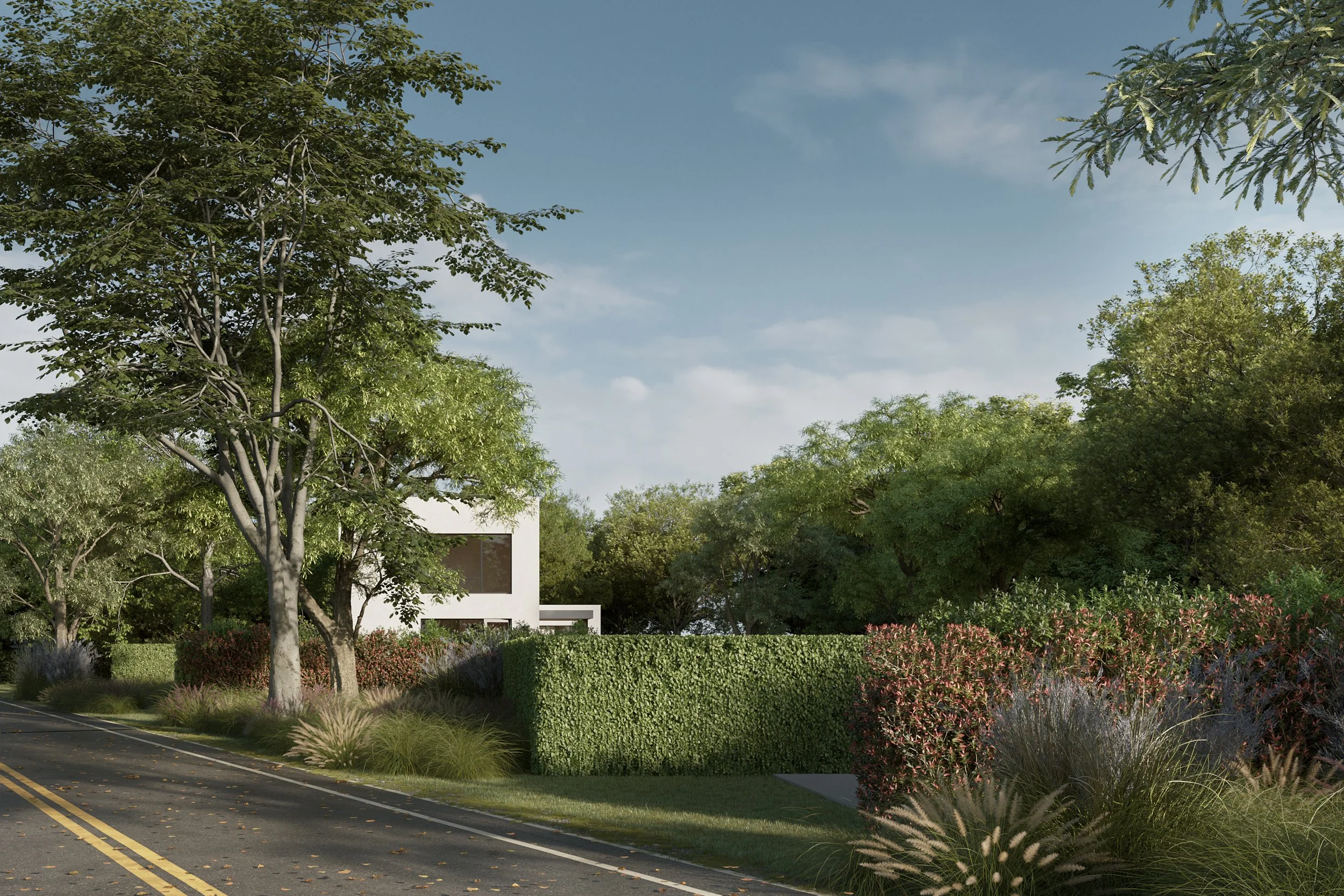 Roadside view of the Bellport Mod Spec home behind a clipped hedge