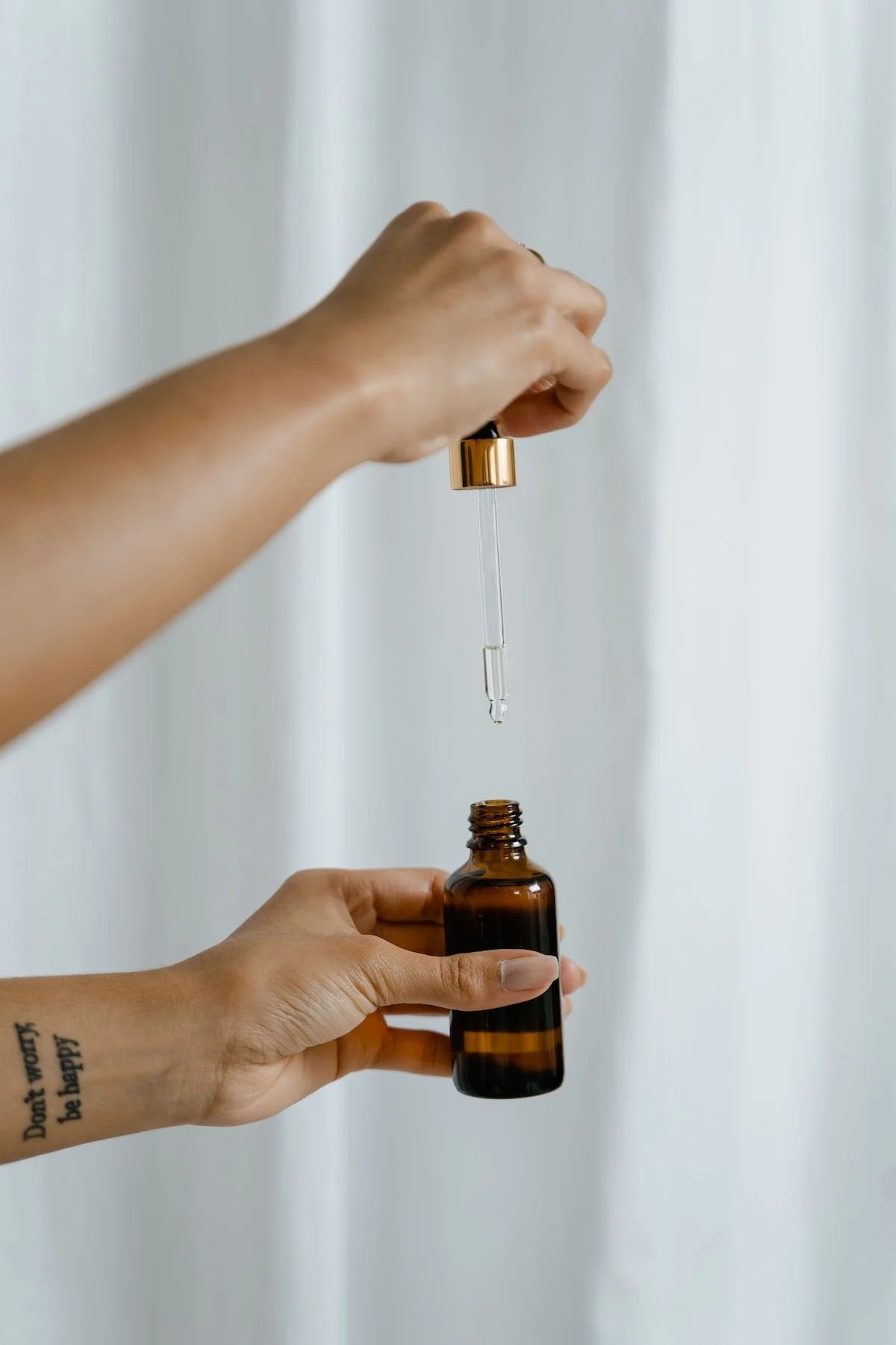 Amber glass dropper bottle containing herbal tincture — naturopathic treatment Australia