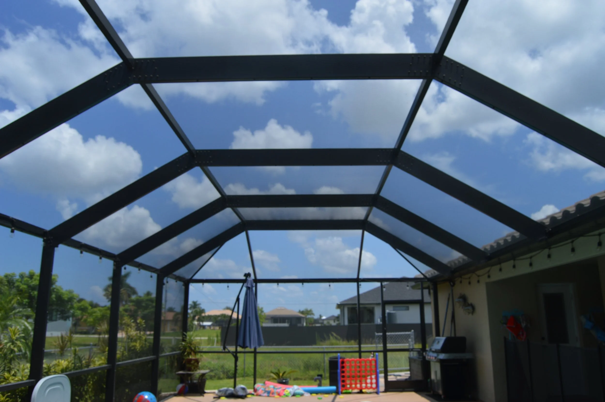 Pool enclosure after soft washing service.