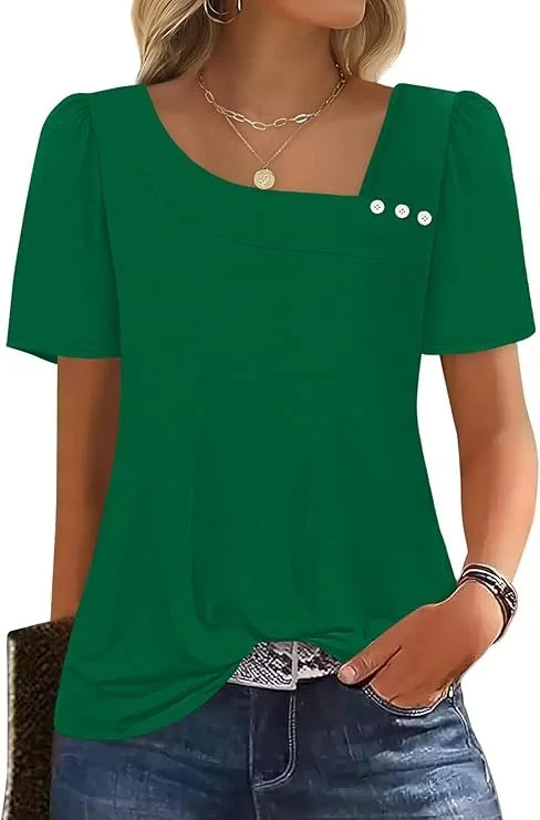 Woman wearing a green short-sleeve top with buttons on the shoulder, paired with blue jeans, layered necklaces, and bracelets.